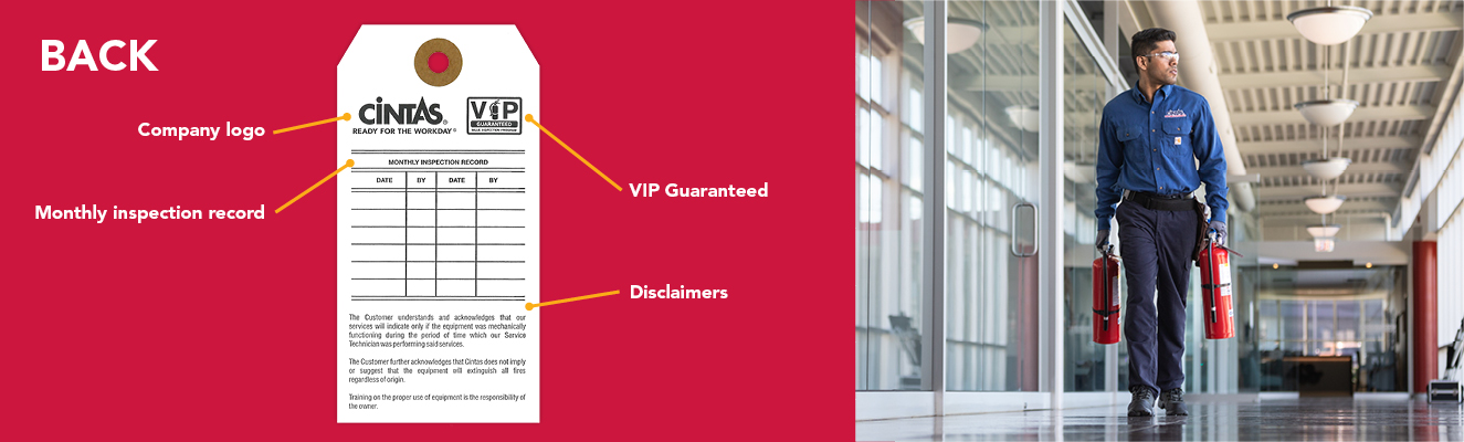 A split image with a red Cintas fire extinguisher inspection tag on the left, featuring a logo, monthly inspection table, VIP guarantee, and disclaimers; on the right, a person in blue work attire walks down a hallway carrying two fire extinguishers.